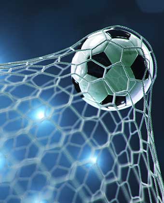 Soccer ball in back of net