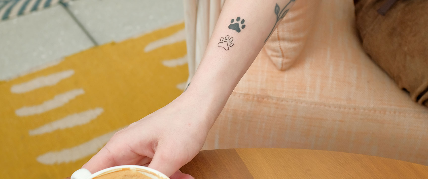 person with a tattoo on their arm